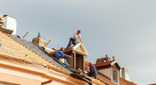 Roofers on the roof.